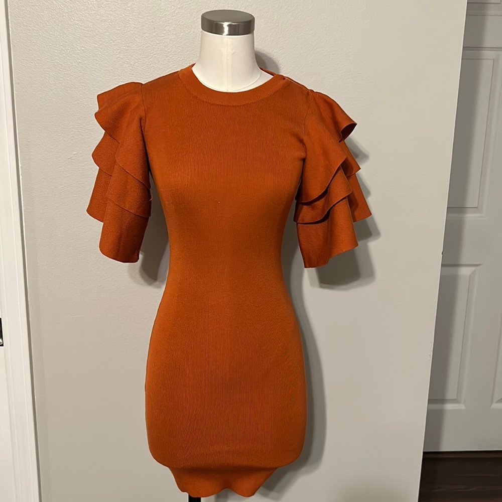 SettleDown BodyCon Dress. Sweater material but stretchy.